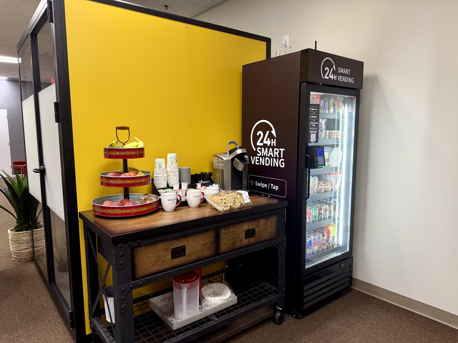 LevelUp installation in a yellow-wall coffee area, view 1